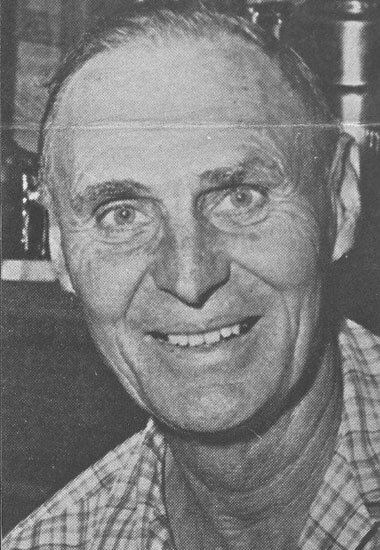 wilson-art Smiling elderly man in black and white portrait.